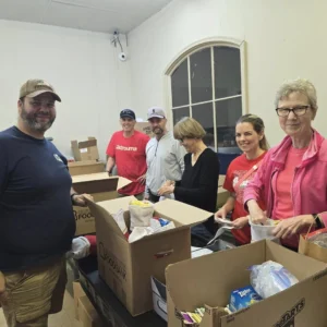 volunteers packing care packages for br soldier outreach